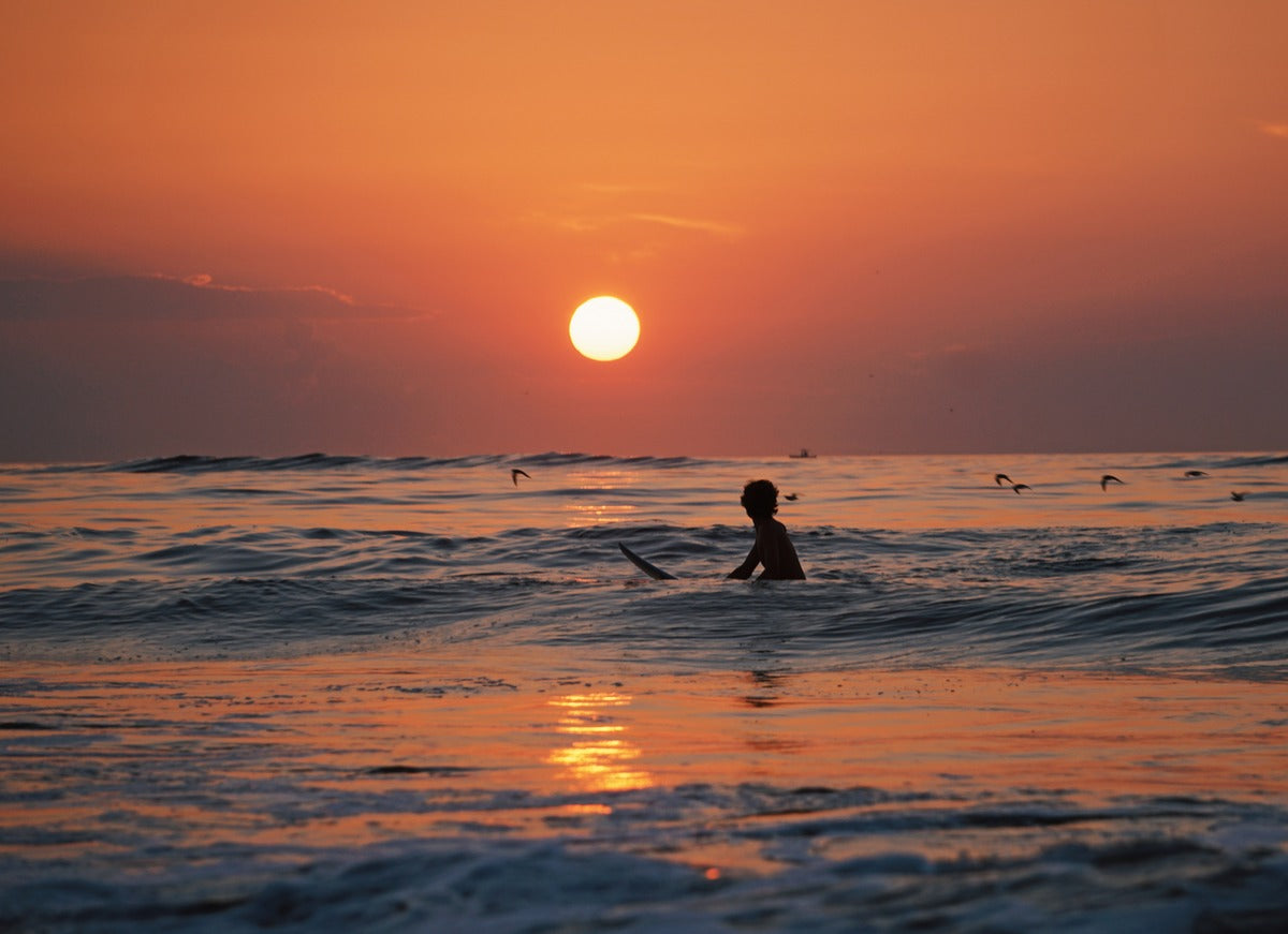 Sunset surfing